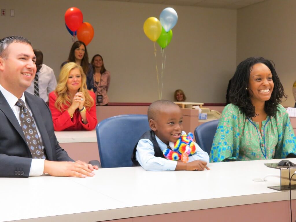 Bryan Soto, Eliah and Tiffany Soto on Elijah's adoption day
