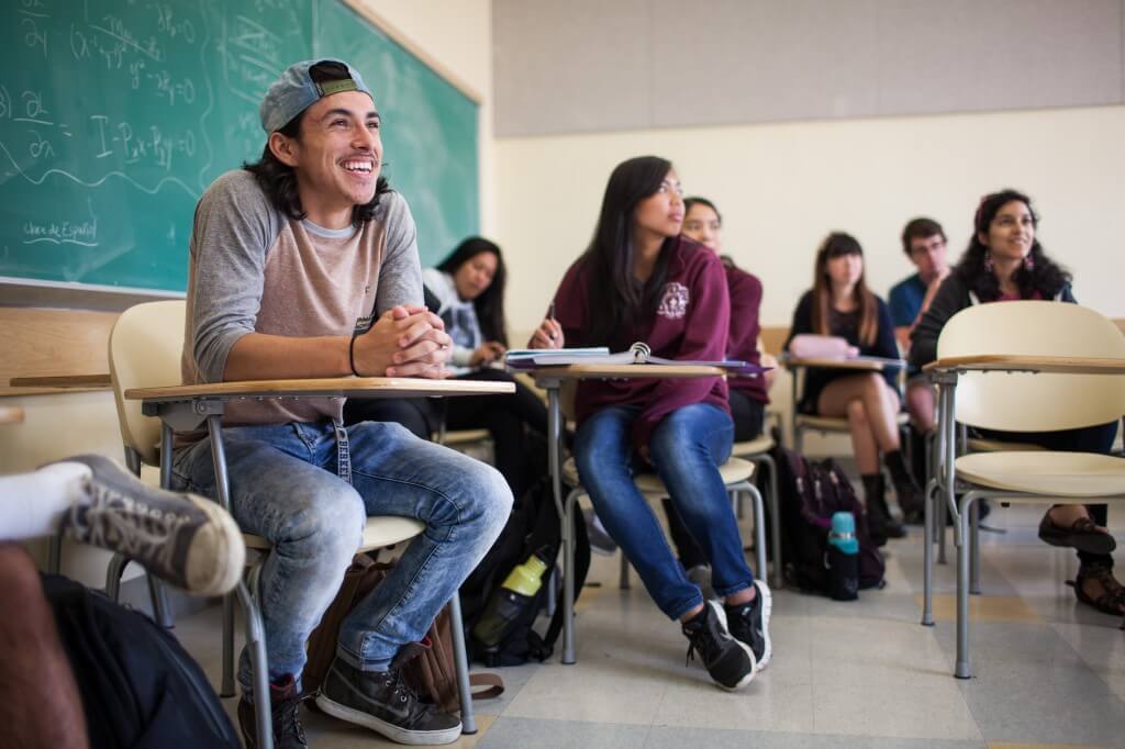 Joseph Bakhit sitting in classroom at UC Berkeley