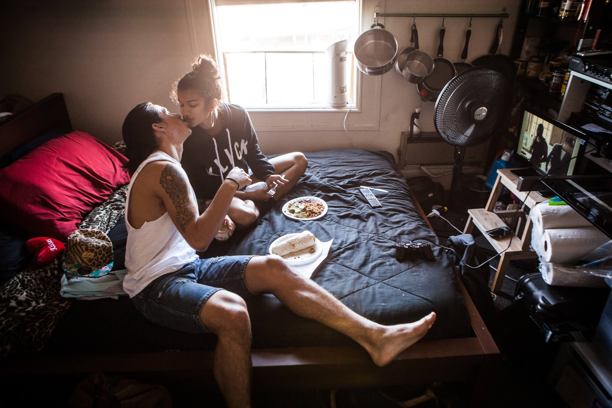 Joseph kisses Sam, his fiancée.