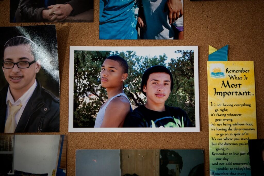 childhood photo of Joseph and Terrick pinned to wall