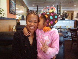 Miranda and her daughter having breakfast before school.