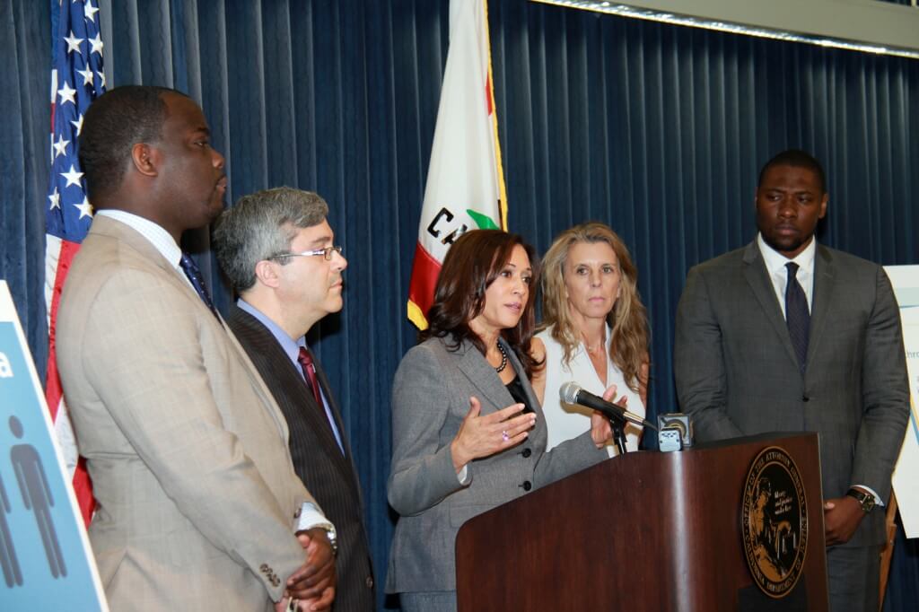 Credit: The California Dept. of Justice California Attorney General Kamala Harris flanked by child advocates during Feb. 12 press conference announcing new 'Bureau of Children's Justice.'