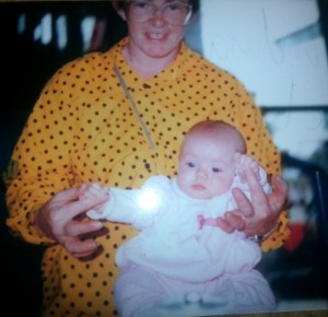 Wendy holds a newborn Angel.