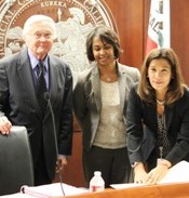 Credit: California Courts Chief Justice Tani Cantil-Sakauye (right) signs a resolution declaring Dec 4, 2013, "Keeping Kids in School and Out of Court Day."