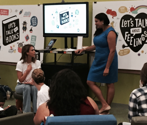 Jessica Alba asking Dr. Dayna Long a question in the Talk, Read and Sing workshop.
