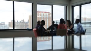 The Think Of Us team at work. 