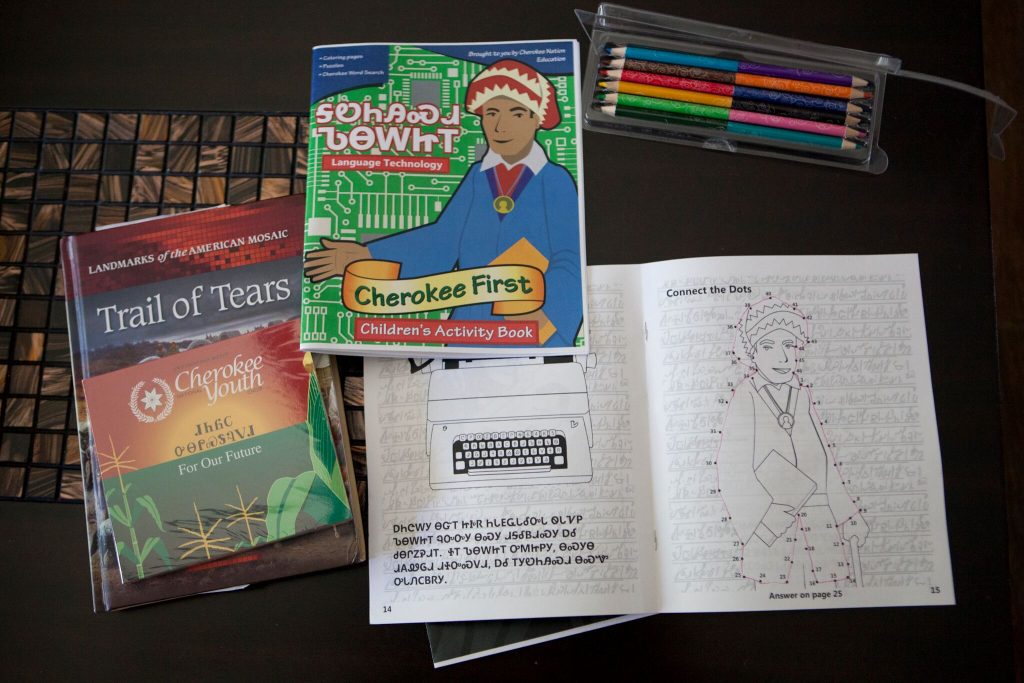 CREDIT: Isabel Avila; Lisa Smith uses these Cherokee coloring books to help sensitize her two foster children to their Native culture.