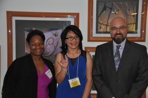 Graduate Karina Guerrero and her DCFS American Sign Language interpreters Darlene Johnson and Jesus Gomez