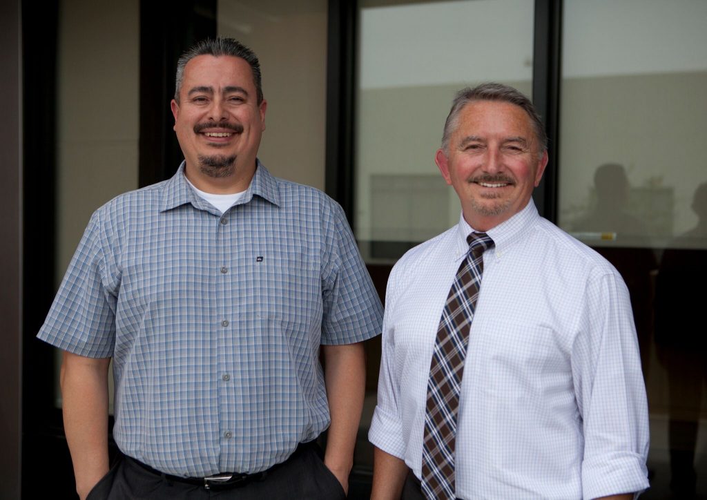 CREDIT: Isabel Avila; Robert Rodriguez (left) and David White run DCFS' 'American Indian Unit.'
