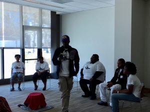 Christopher "Teddy" Mundy performs a song. Photo Credit: Thalia Henderson, The RightWay Foundation