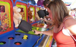Whack-a-mole players. Photo: AcesTooHigh