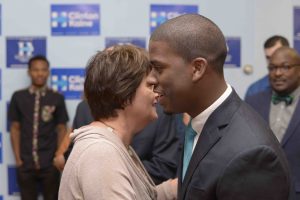 CREDIT: Bernard Rogers Holton and Cancel share a few words before she departs. 