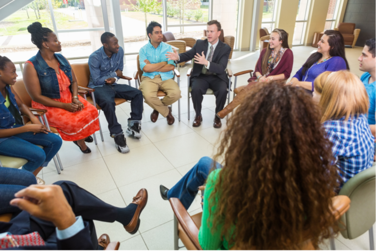 Youths gather for a discussion.