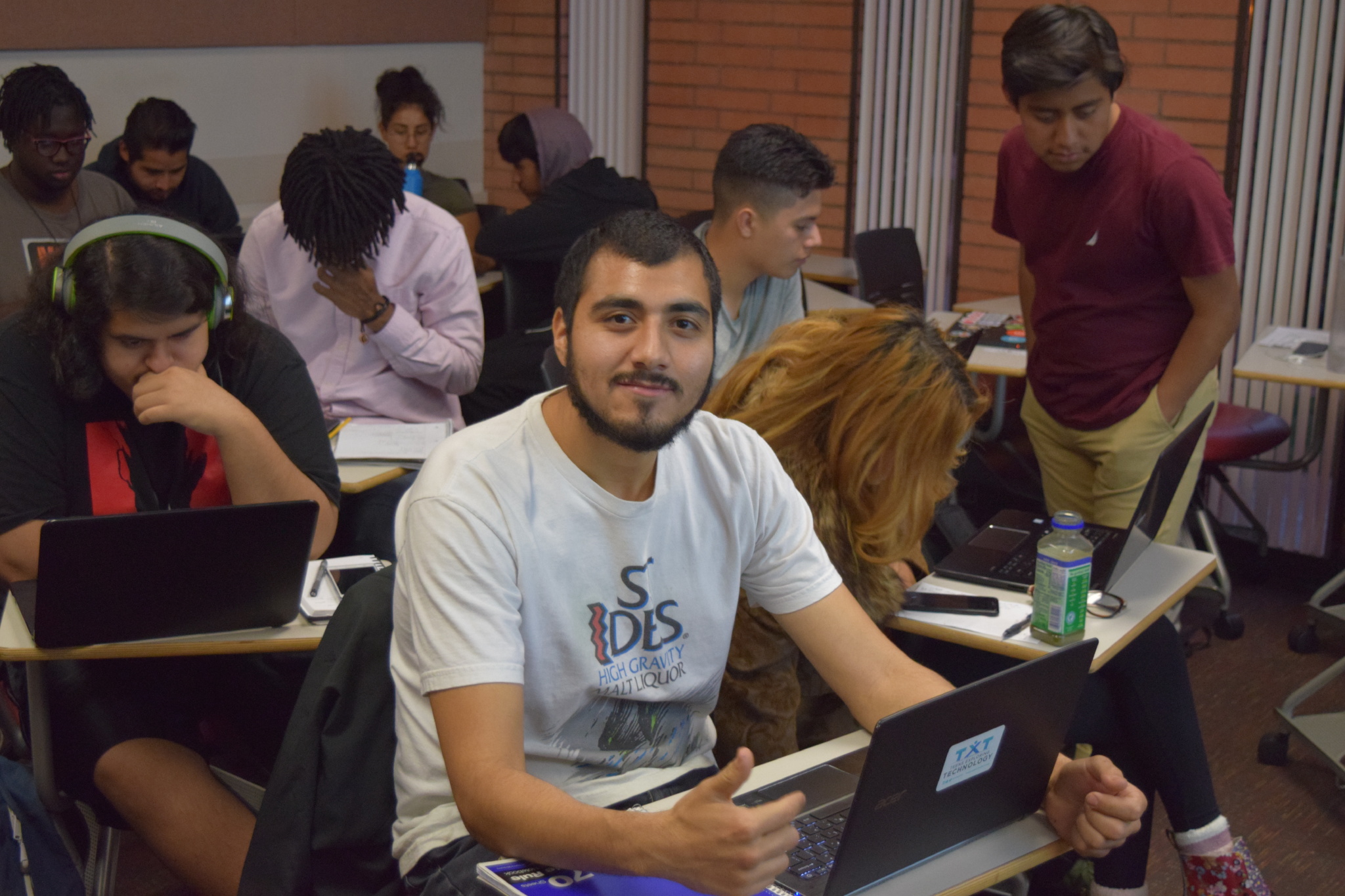 Jose Colmenares in coding boot camp with other current and former foster youth